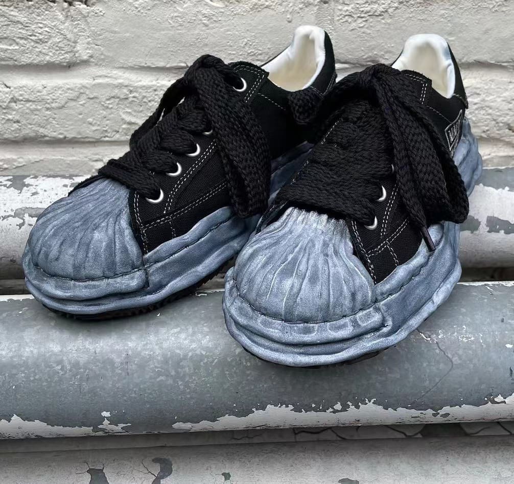 ma*s*n Ma*i*la mm6 digital print casual trousers